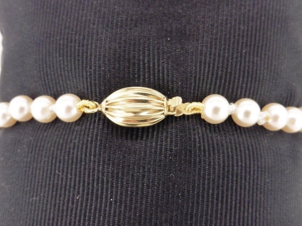 Parel armband met gouden slot                            D53, Overige materialen, Gebruikt, Overige kleuren, .