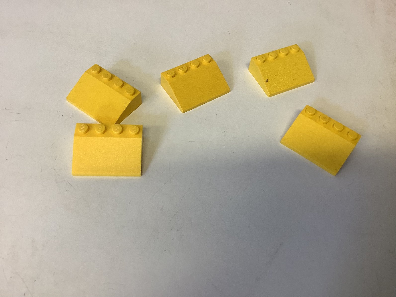 Lego dakpan 33 3x4 geel, Ophalen of Verzenden, Gebruikt, Losse stenen, Lego