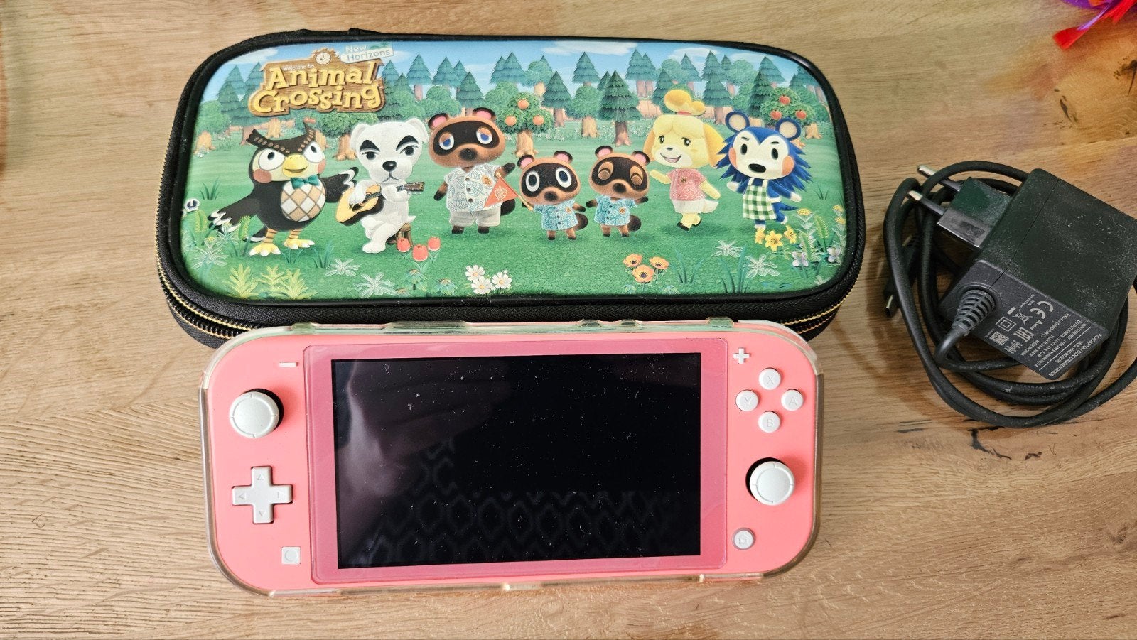 Nintendo Switch Lite met Animal Crossing hoesje, Ophalen of Verzenden, Roze of Coral, Zo goed als nieuw, Met beschermhoes of tas
