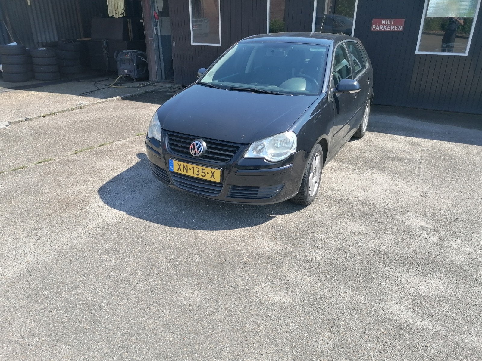 Volkswagen polo 1.4-16V 2006, Auto's, Volkswagen, Voorwielaandrijving, Stof, 4 cilinders, Zwart