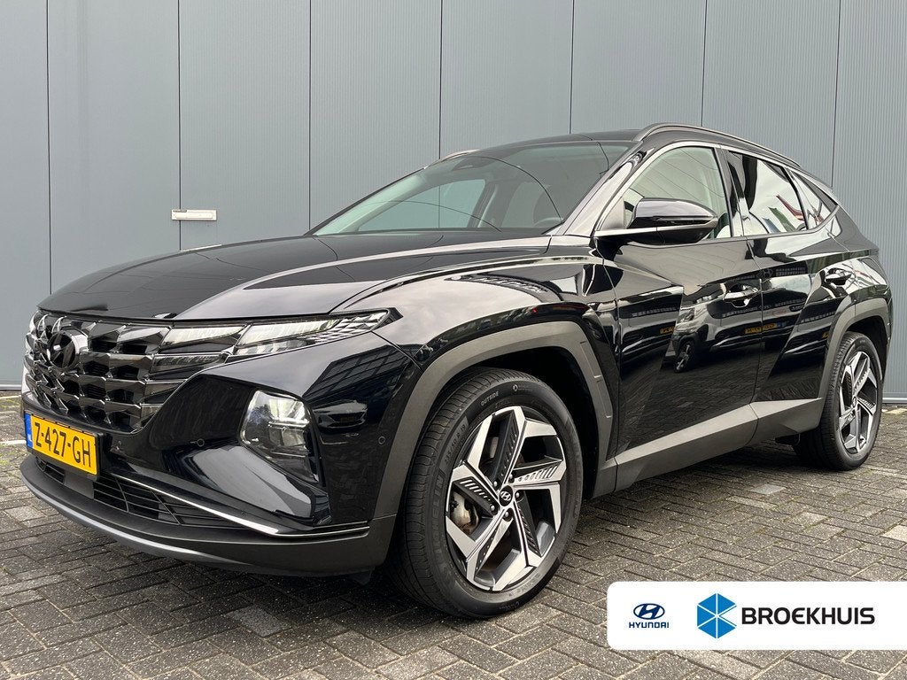 Hyundai Tucson 1.6 T-GDI 265pk PHEV Premium 4WD, Gebruikt, 4 cilinders, Zwart, Bedrijf