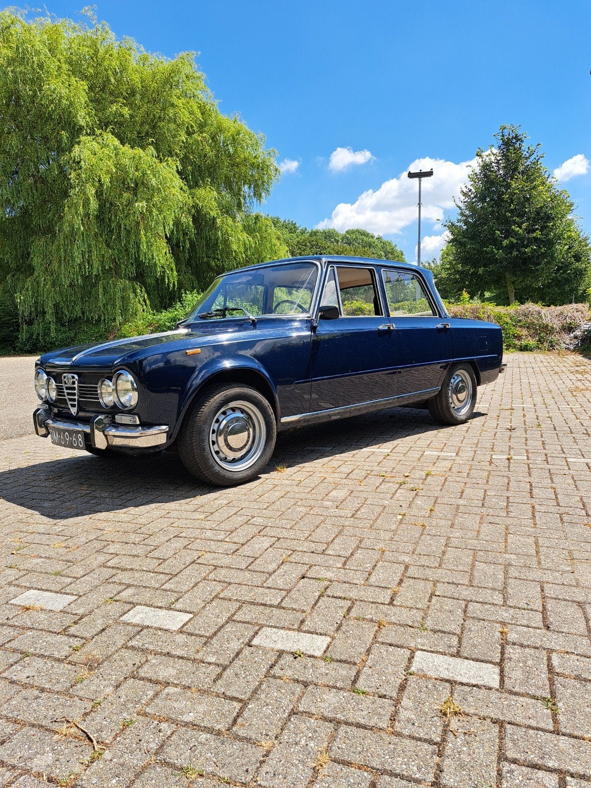 Alfa Romeo Giulia 1300 Super (1970), 1025 kg, 4 cilinders, Blauw, 103 pk