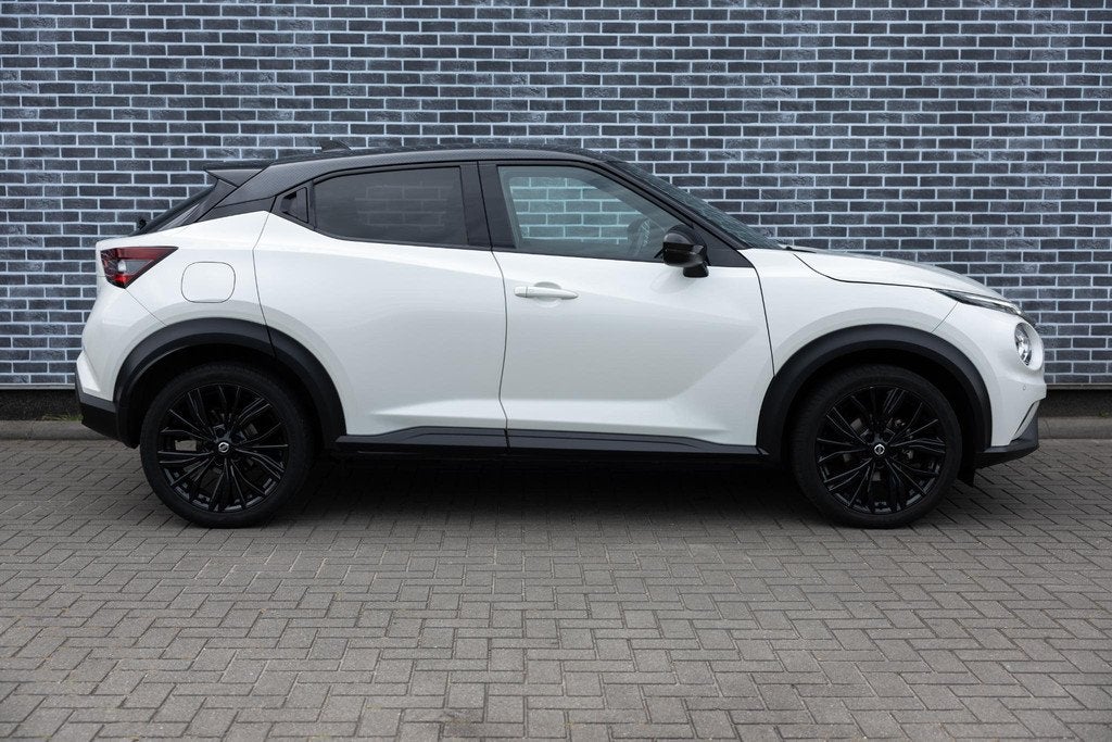 Nissan Juke 1.0 DIG-T 114 DCT-7 Enigma | Two-Tone | Achterui, Auto's, Nissan, Stof, Automatische klimaatregeling, Wit, Origineel Nederlands