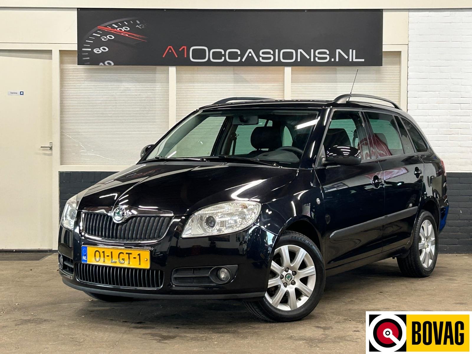 Skoda Fabia Combi 1.4-16V Sprint (bj 2010), Auto's, Voorwielaandrijving, Zwart, Origineel Nederlands, Grijs