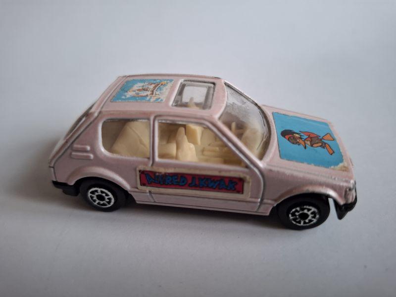 Peugeot 205 GTI Alfred J Kwak roze van Edocar 3 inch model, Hobby en Vrije tijd, Modelauto's | Overige schalen, Ophalen of Verzenden