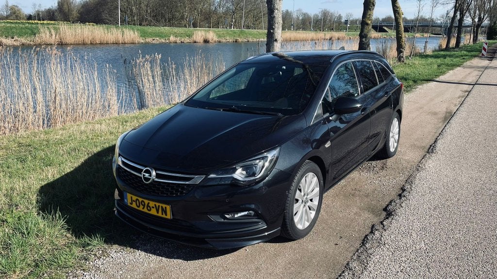 Opel Astra 1.4 Turbo 110KW Sports Tourer 2016 met NIEUWE APK, Auto's, Opel, Voorwielaandrijving, Zwart, 4 cilinders, Zwart