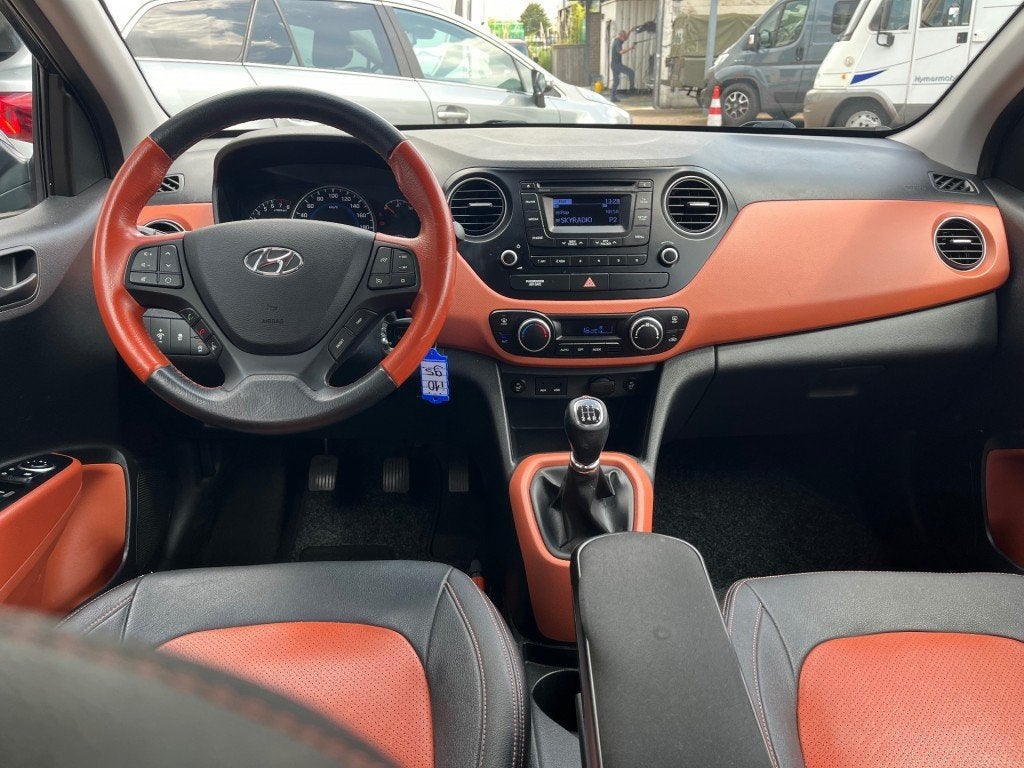 Hyundai I10 1.0I i-Motion CF+ Clima Cruise Leder Stoelv. Blu, Auto's, Hyundai, Euro 5, Gebruikt, 31 €/maand, USB