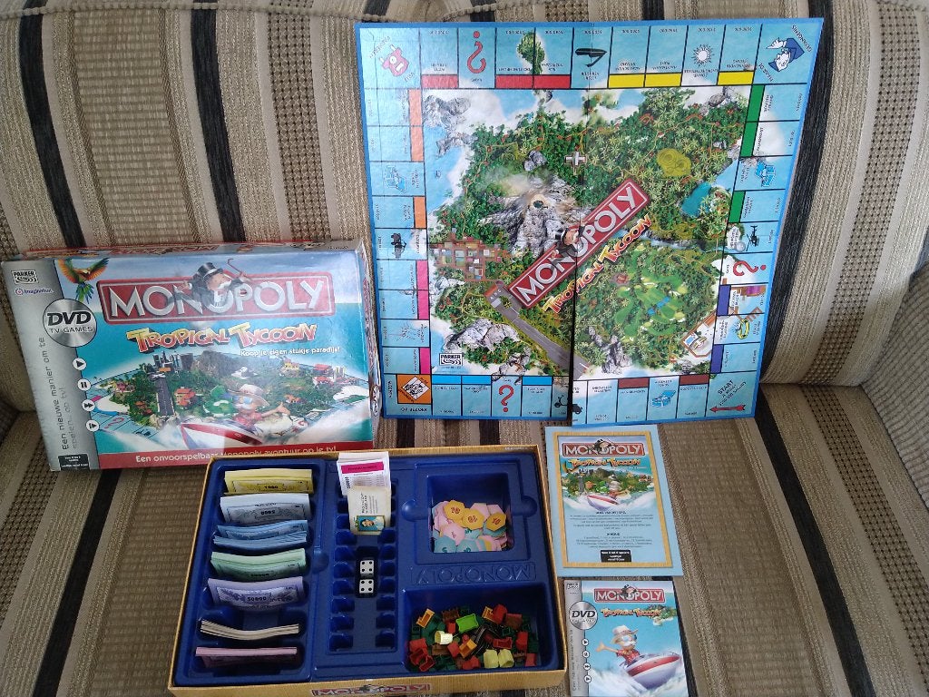 Bord spel monopoly tropical tyfoon dvd versie, nieuwstaat, Hobby en Vrije tijd, Ophalen of Verzenden, Zo goed als nieuw, Parker