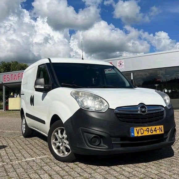 Opel Combo 2013 rijd en schakelt goed AIRCO TREKHAAK, Auto's, Bestelauto's, 21 km/l, Euro 5, Stof, 4 cilinders