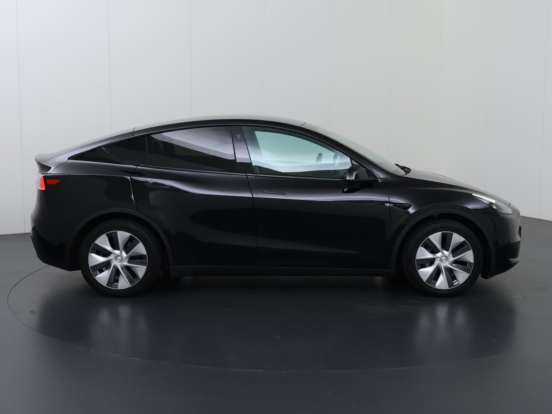 Foto 6 van Tesla Model Y RWD 58 kWh | Panoramadak | 360° Camera | Stoe