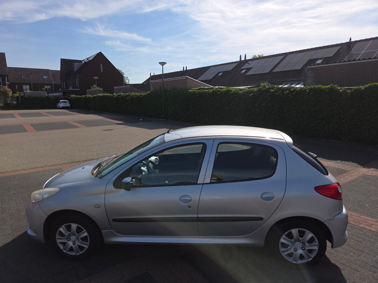 Peugeot 206+ 1.4 5D 2010 Grijs, Auto's, Peugeot, Voorwielaandrijving, 206+, 31 €/maand, 4 cilinders
