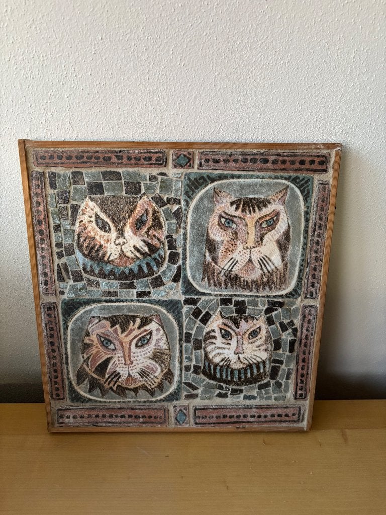 Keramisch wandpaneel katten, Ophalen
