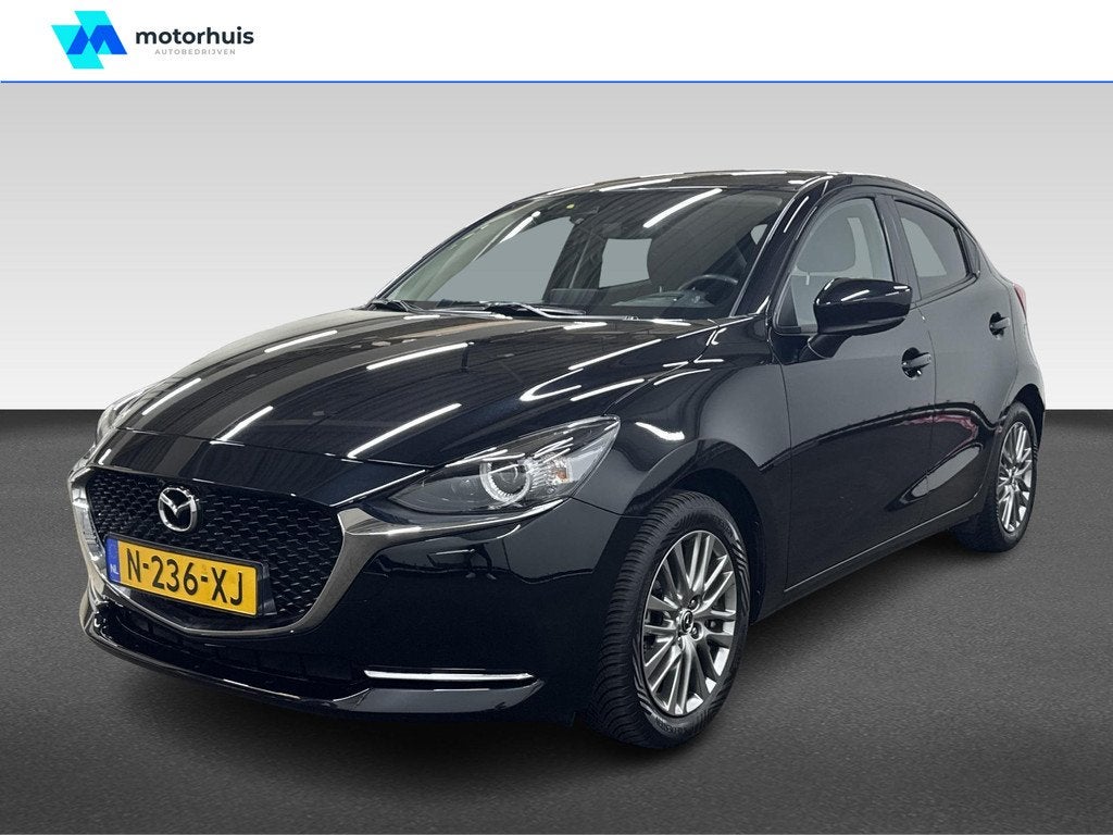 Mazda 2 1.5 SKYACTIV-G 90PK LUXURY NAVI CAMERA HUD LED ECC N, Auto's, Mazda, Stof, 4 cilinders, Stuurwielverwarming, Zwart