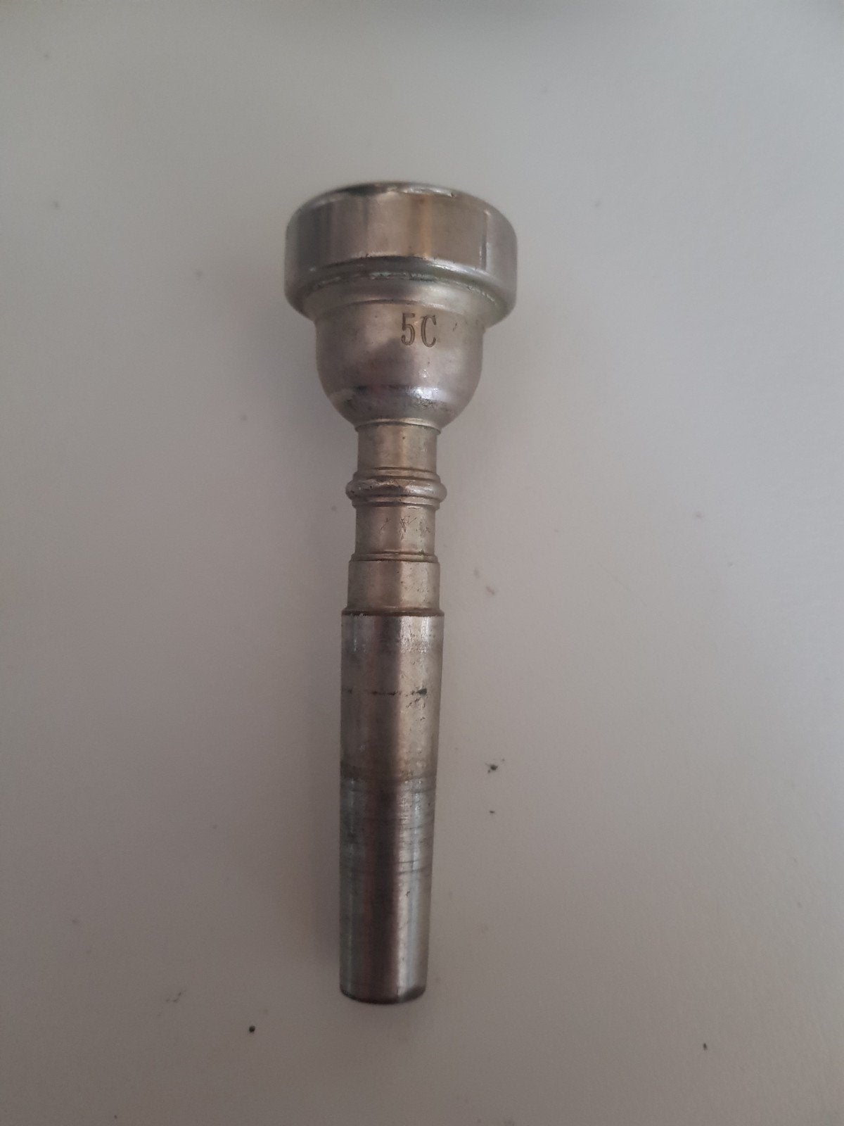 trompet mondstuk 5C, Ophalen