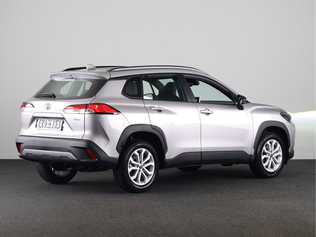 Toyota Corolla Cross Hybrid 140 Active *NIEUW* | Direct leve, Auto's, Toyota, 12 maanden, Stof, Zwart, 4 cilinders
