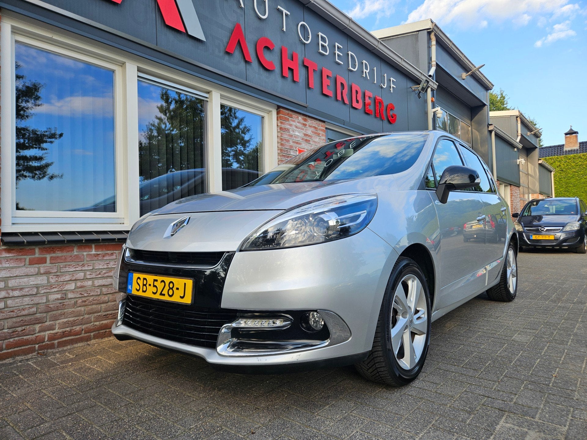 Renault Scénic 1.2 TCe Bose Trekhaak! Airco/Clima! Cruise C, Auto's, Voorwielaandrijving, Euro 5, Gebruikt, 1295 kg