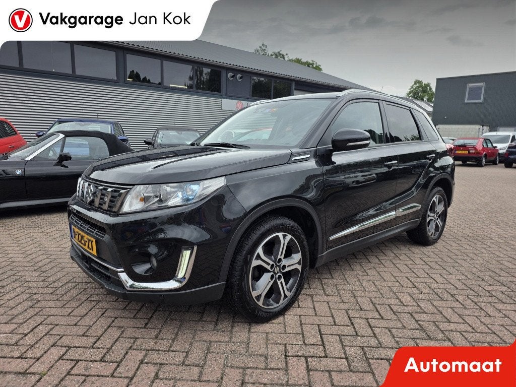 Suzuki Vitara 1.4 B.jet AllGRIP Stijl automaat, panoramadak., Auto's, Automaat, Dealer onderhouden, 1195 kg, Gebruikt