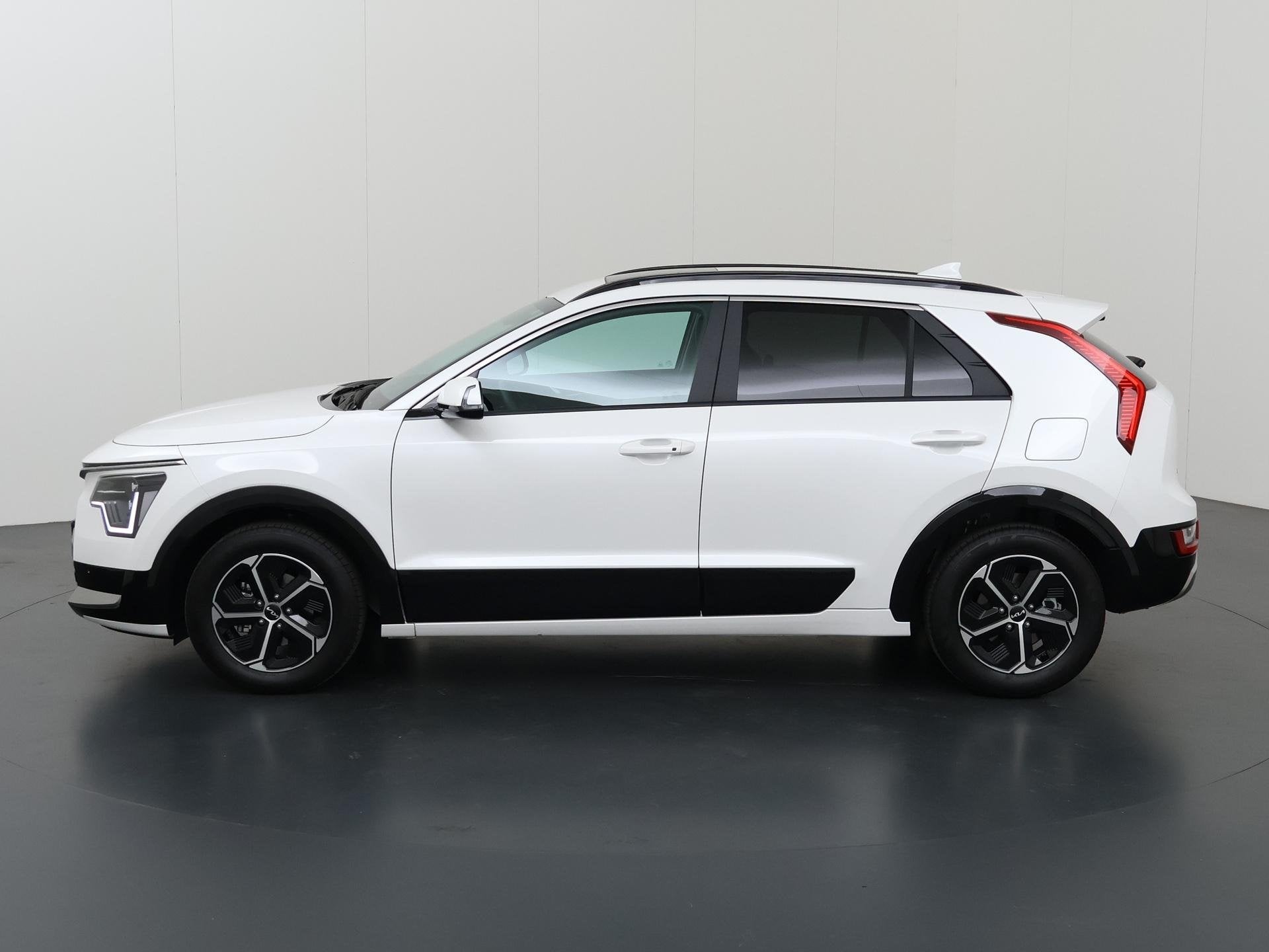 Kia Niro 1.6 GDi Hybrid DynamicPlusLine | Schuif-/kantel zon, Auto's, Kia, 137 pk, Leder en Stof, Wit, Bedrijf