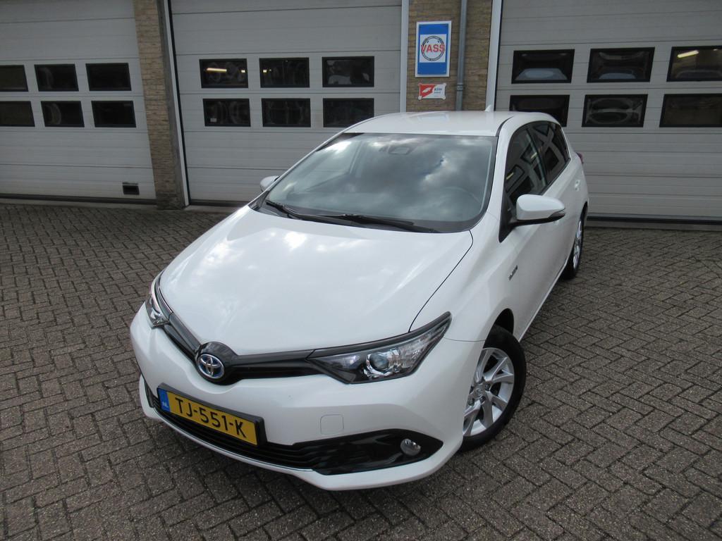 Toyota Auris 1.8 Hybrid Dynamic Go PARELMOERLAK (bj 2018), Auto's, Gebruikt, Euro 6, 4 cilinders, Origineel Nederlands