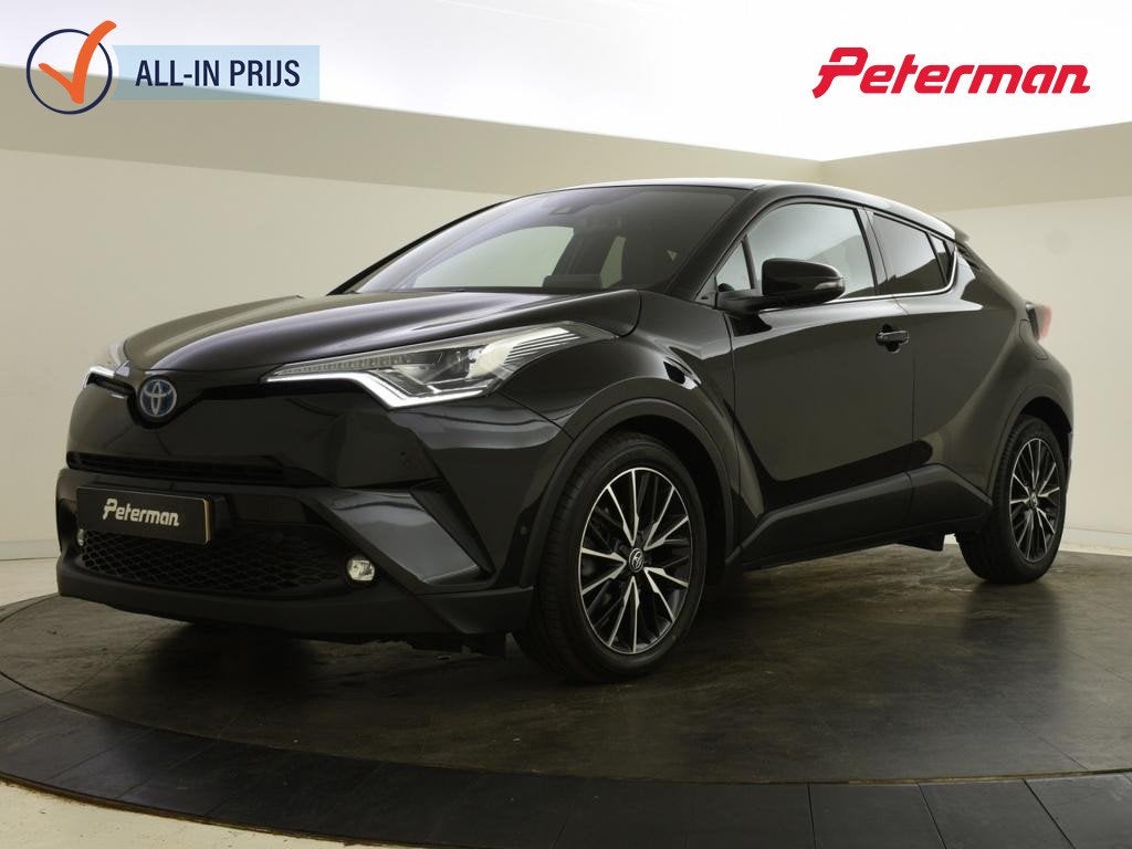Toyota C-HR 1.8 Hybrid Executive | Halfleer | PDC | Blindspo, Euro 6, 4 cilinders, Leder en Stof, 26 km/l