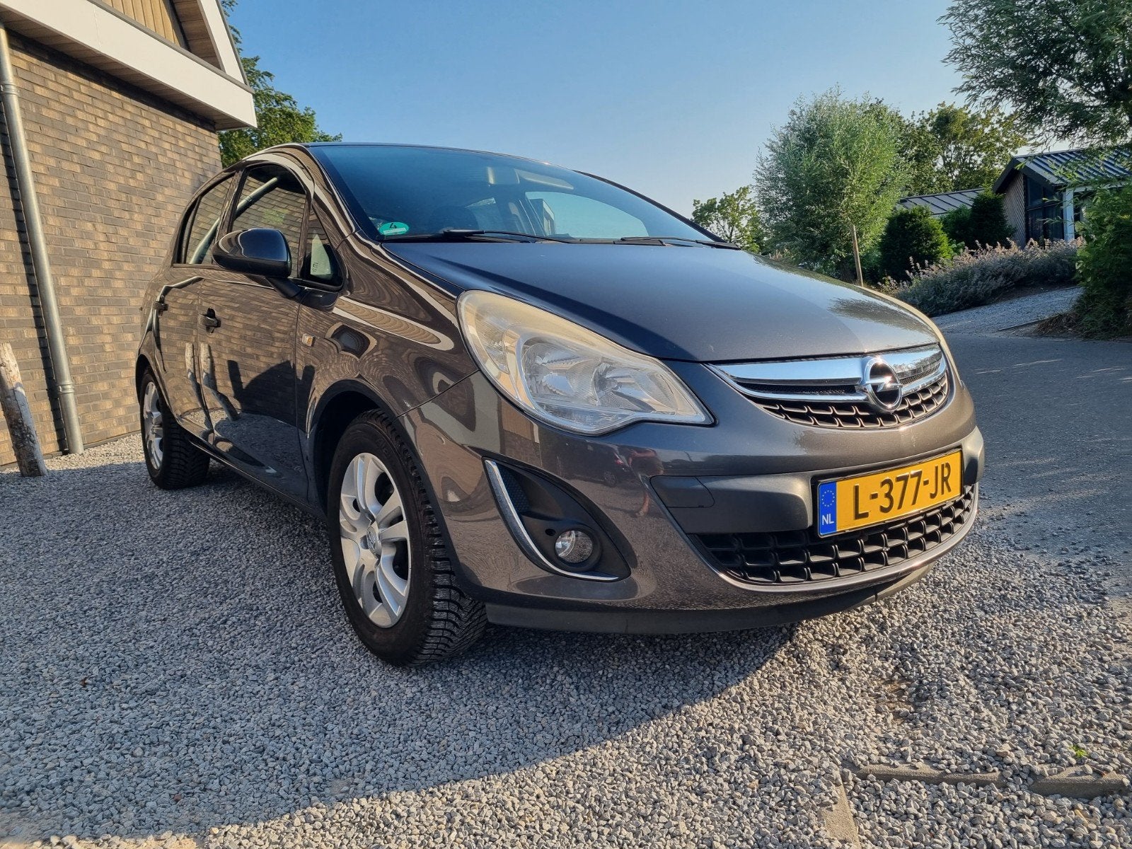 Opel Corsa 1.2 16V 5D 2011 Grijs, Voorwielaandrijving, 4 cilinders, 1229 cc, 49 €/maand