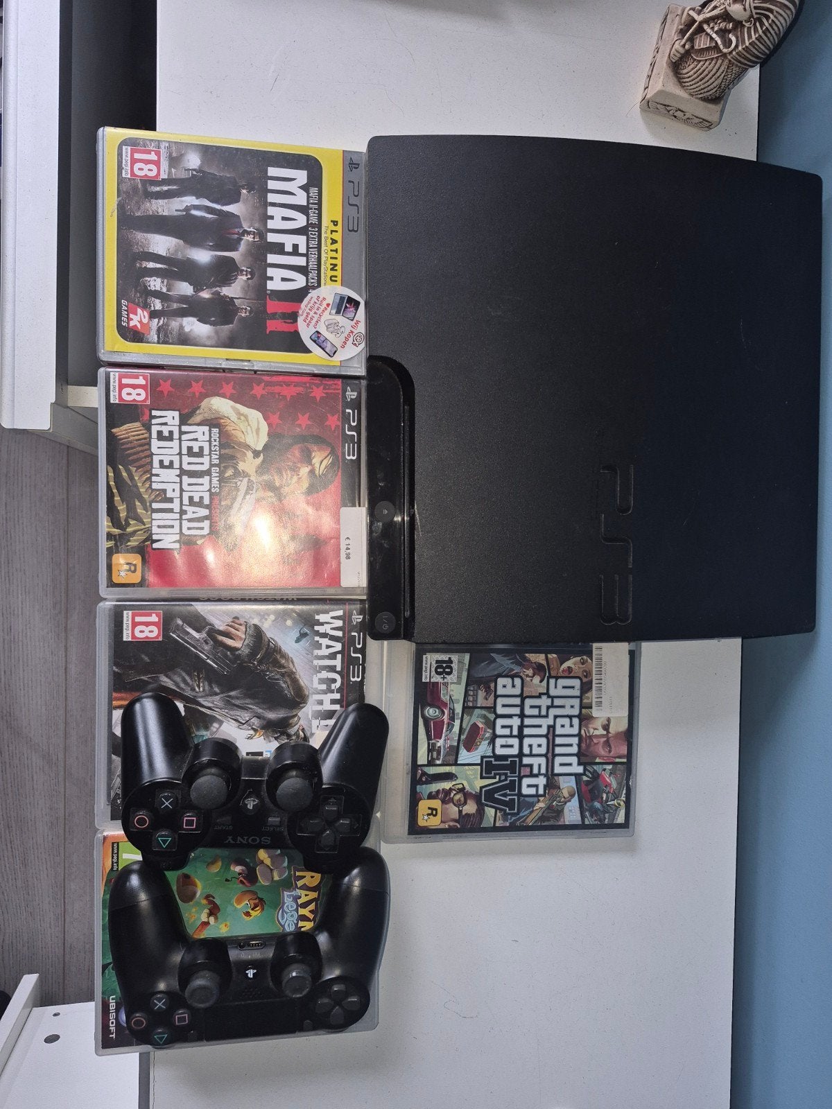 PlayStation 3 Slim met 2 controllers en 5 topgames, Met games, Met 2 controllers, Zo goed als nieuw, Slim