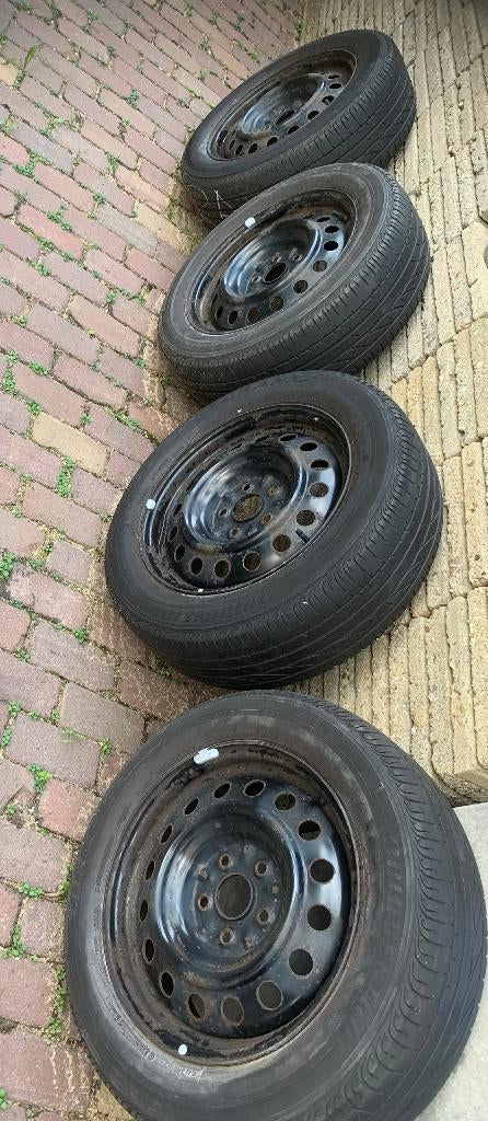 4 X Bridgestone Turanza ER300 205/60R 92V 4mm + Toyota dop, Ophalen