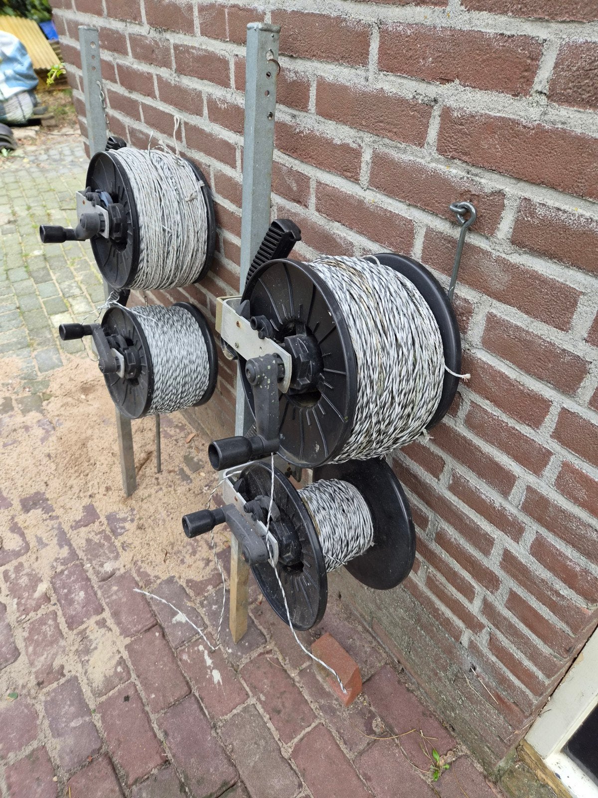 2x haspelpaal met haspels met draad., Tuin en Terras, Ophalen, Gebruikt, 20 meter of meer