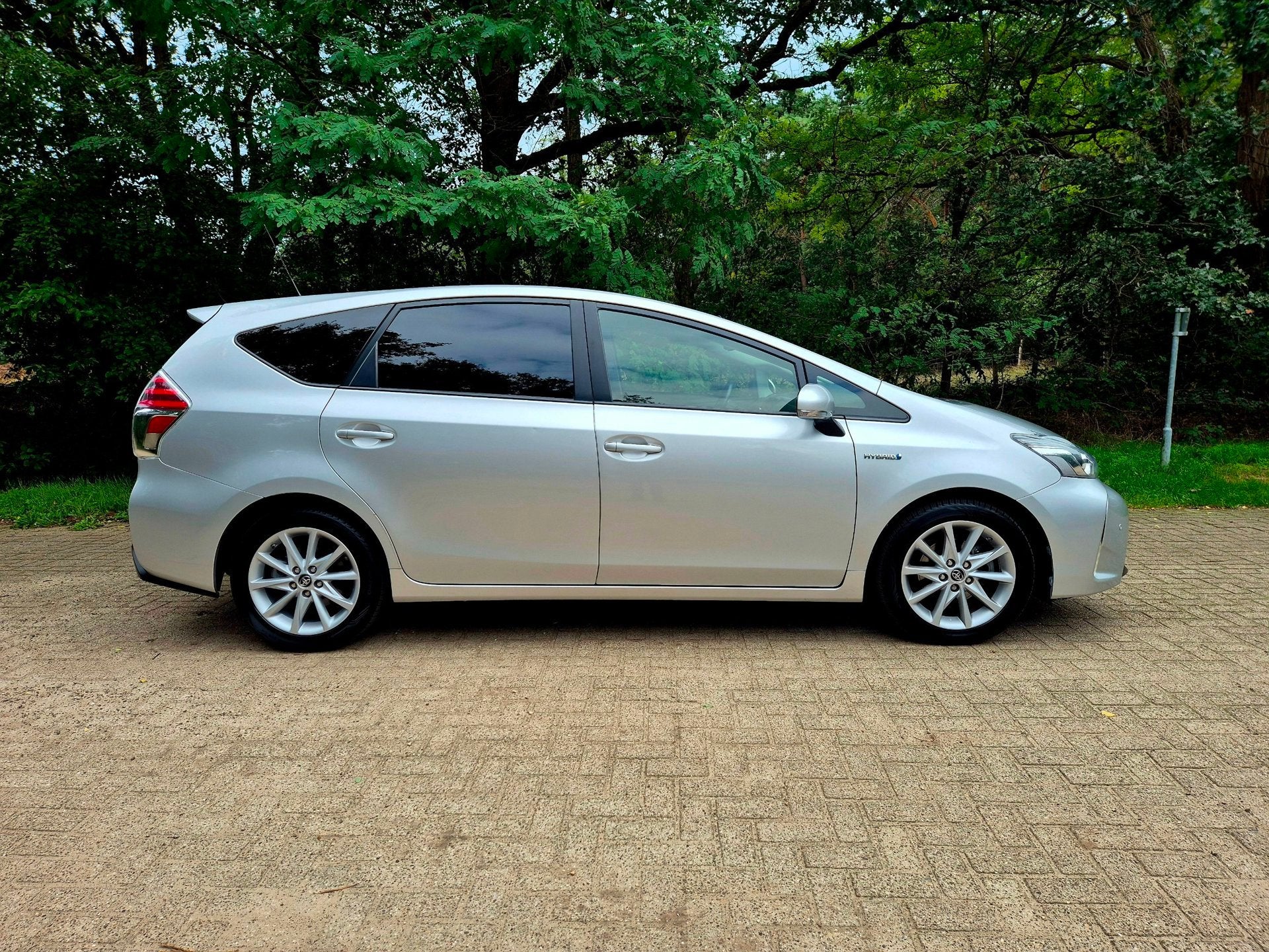 Toyota Prius Wagon 1.8 Lease 7 persoons trekhaak, Auto's, Dealer onderhouden, Gebruikt, 4 cilinders, 23 km/l