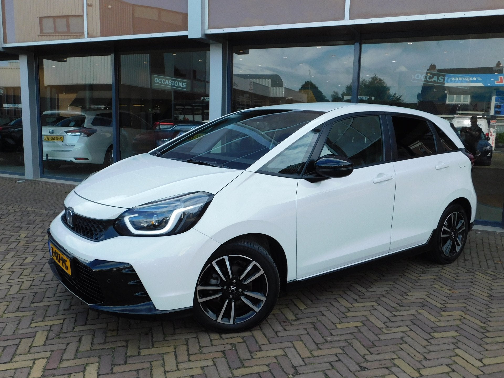 Honda Jazz 1.5 e:HEV Advance Sport (bj 2024, automaat), Auto's, 12 maanden, Euro 6, 4 cilinders, Leder en Stof