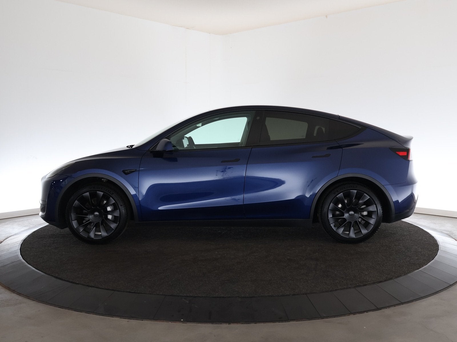 Tesla Model Y RWD 58 kWh | Trekhaak | 20'' | Leder | 12 maan, Auto's, 238 pk, Achterwielaandrijving, Gebruikt, Zwart