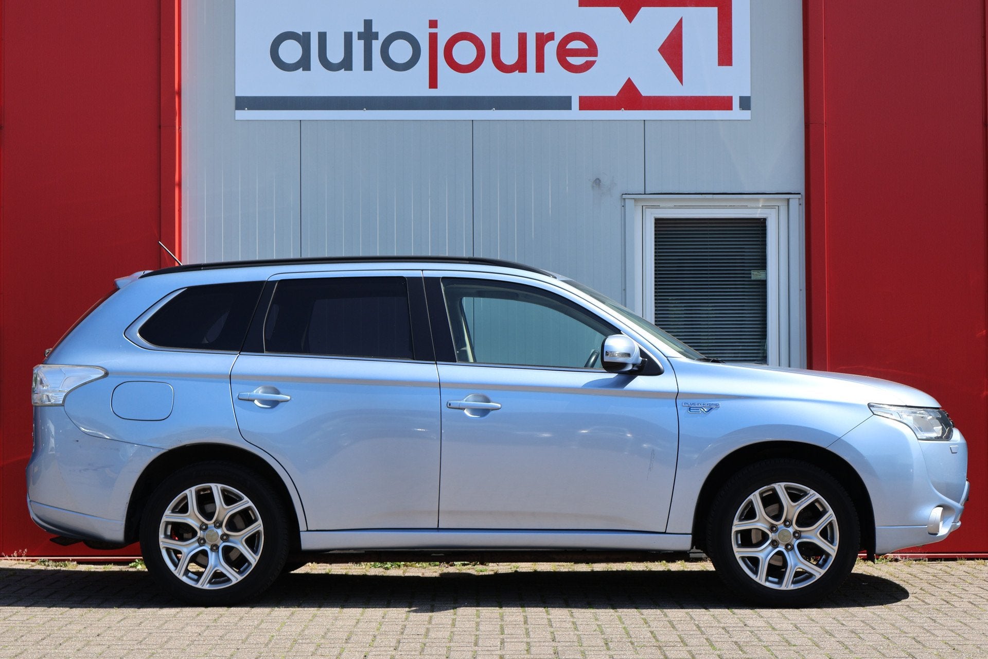 Mitsubishi Outlander 2.0 PHEV Instyle (bj 2013, automaat), Auto's, Zwart, 4 cilinders, Blauw, Bedrijf