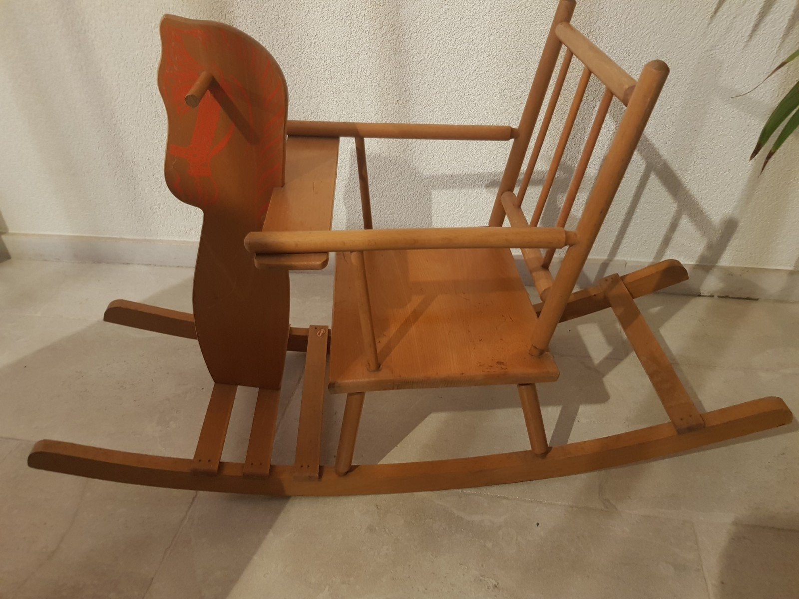 Houten hobbelpaard., Ophalen