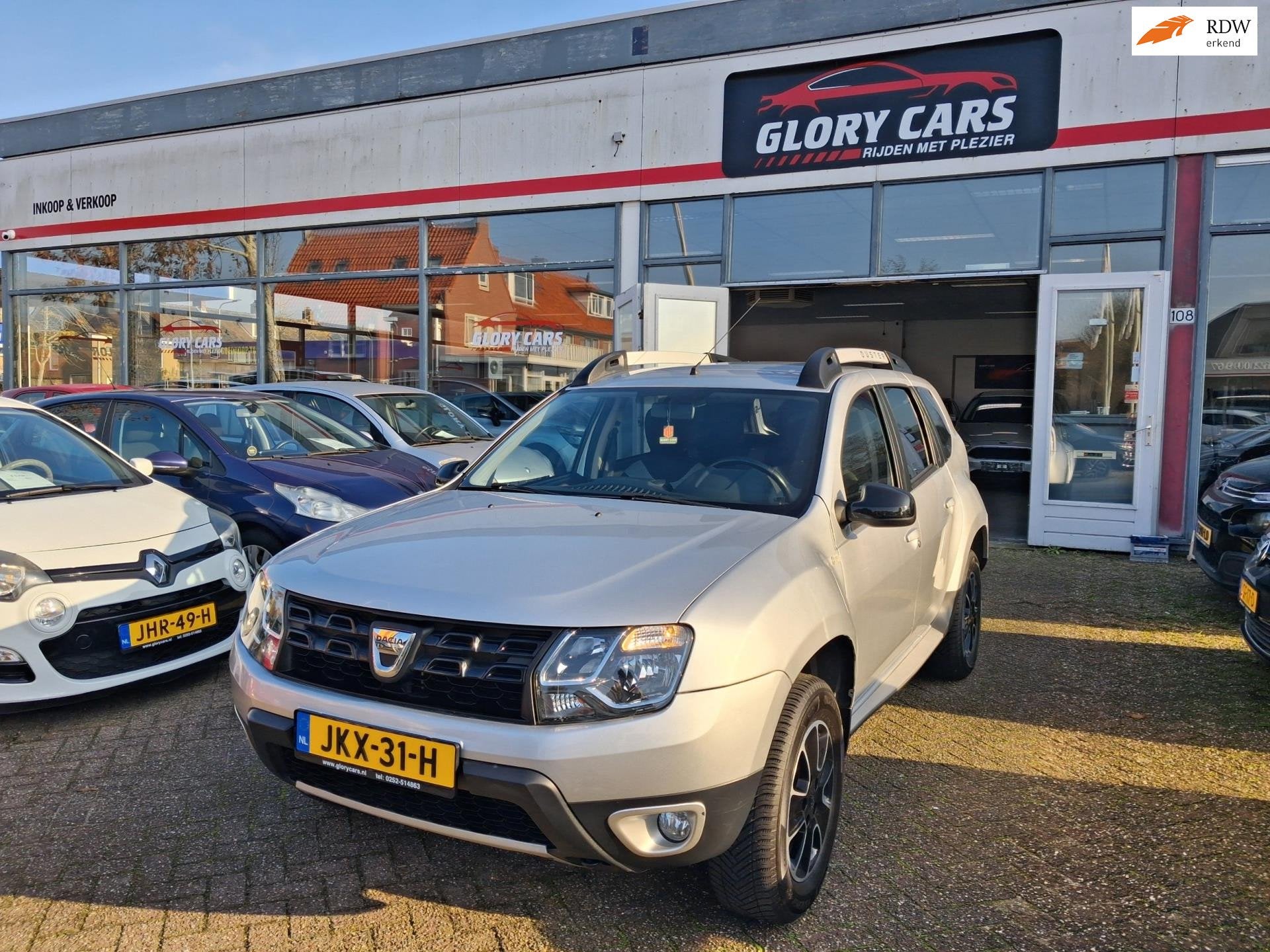 Dacia DUSTER 1.2 TCe 4x2 Ambiance CAMERA-NAVI-CRUISE, Auto's, Voorwielaandrijving, Gebruikt, Euro 6, 4 cilinders