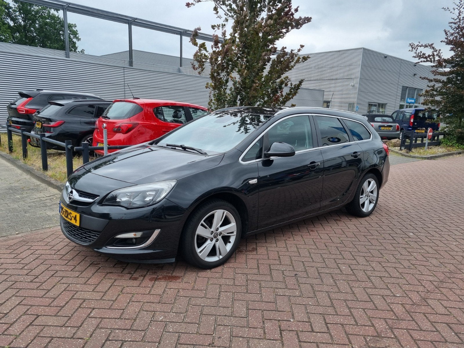 Opel Astra 1.4 Turbo 88KW ST 2013 Zwart, Auto's, Voorwielaandrijving, 4 cilinders, Zwart, Origineel Nederlands