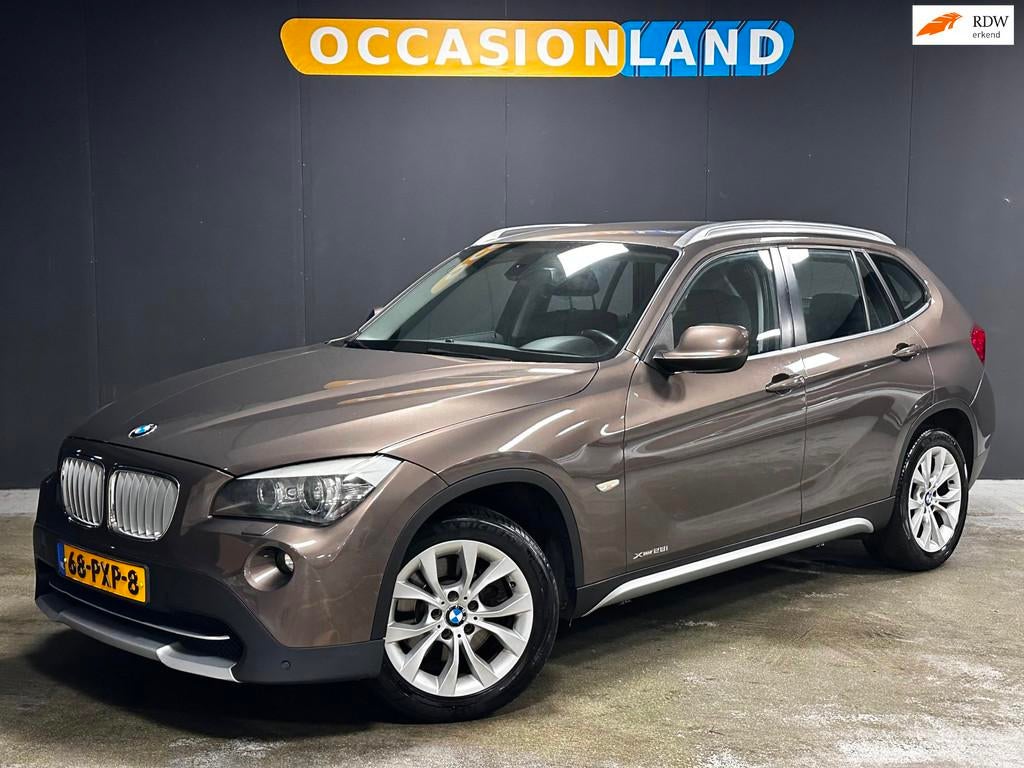 BMW X1 XDrive28i Executive|AUTOMAAT|CRUISE|BLUETOOTH|NAVI|CA, Auto's, BMW, Euro 5, Stof, Gebruikt, Zwart