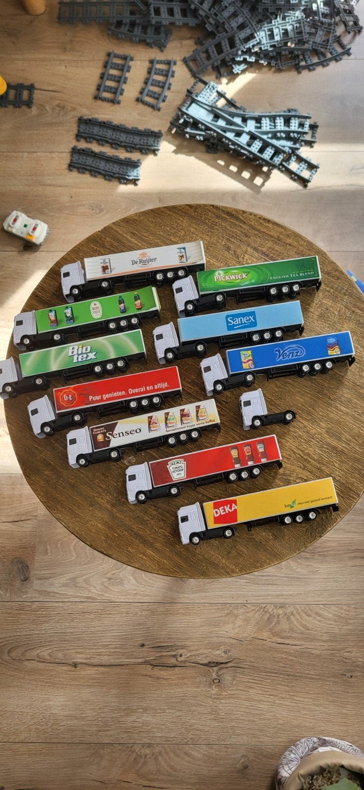 Verzameling van 11 miniatuur vrachtwagens met reclame, Ophalen of Verzenden, Gebruikt