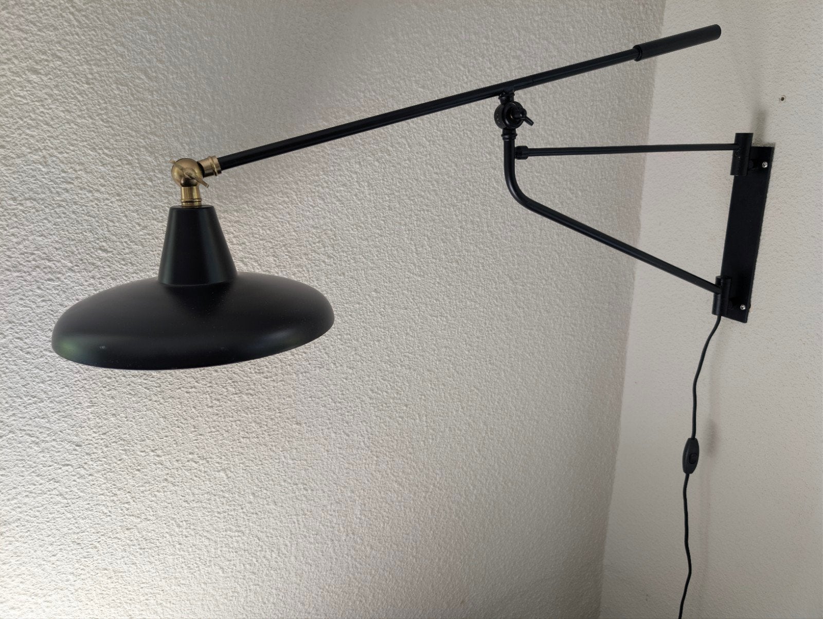 Dutchbone wandlamp Hector, zwart, Ophalen, Up-/downlighter, Zwart, E27 (groot)