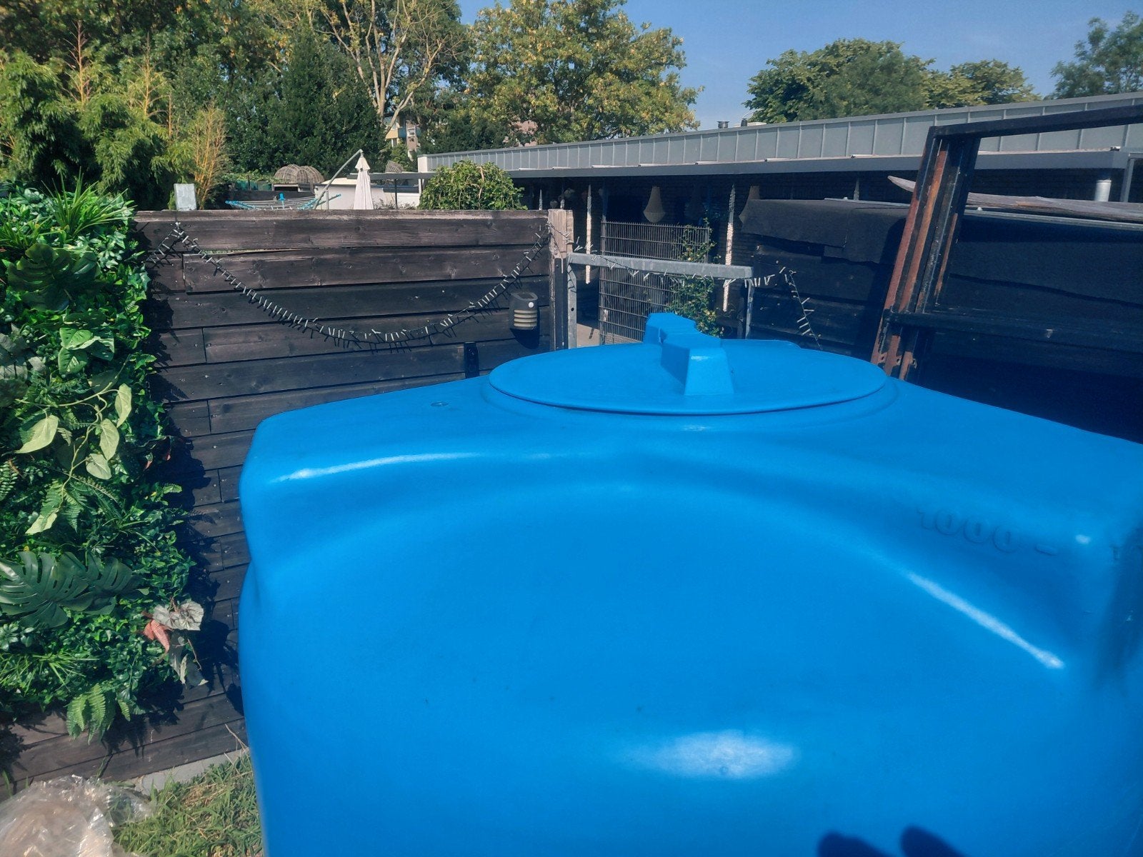 Grote blauwe watertank - 1000 liter, 150 liter of meer, Ophalen of Verzenden, Gebruikt, Kunststof