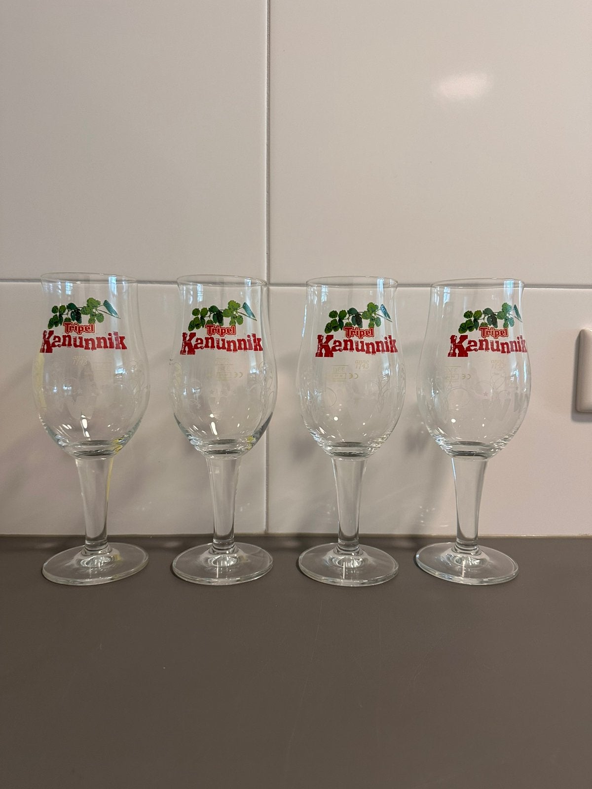 4x Originele Tripel Kanunnik Bierglazen (33 cl), Ophalen of Verzenden, Zo goed als nieuw, Glas of Glazen, Overige merken