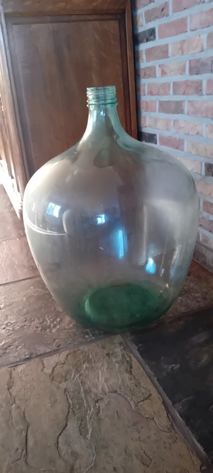 Brocante dame jeanne fles, Ophalen