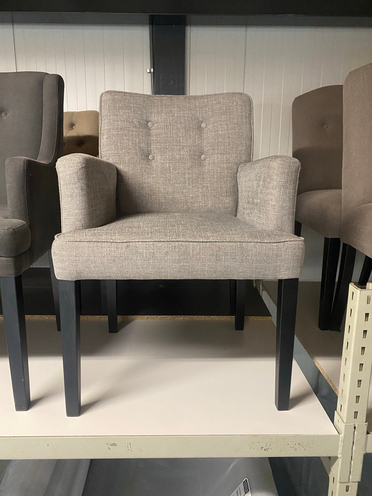 2x Eetkamerfauteuil Stan showroom model - Grijs, Ophalen, Twee, Zo goed als nieuw, Stof