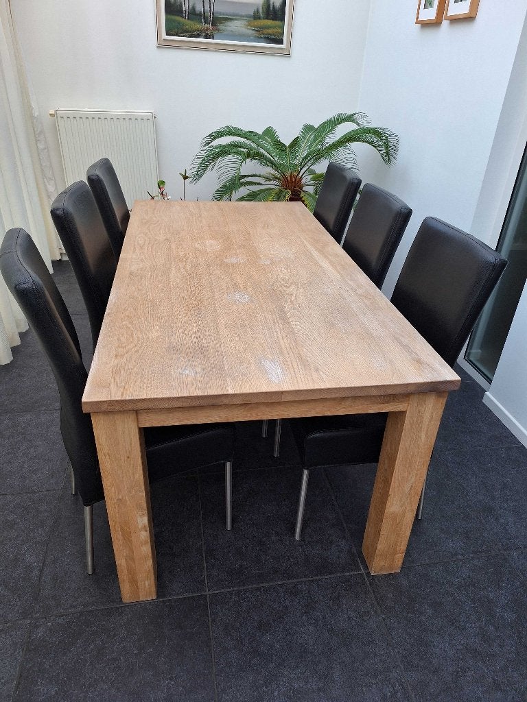 Licht eiken eettafel met 6 zwart leren stoelen, Ophalen, Gebruikt, Eikenhout, 50 tot 100 cm