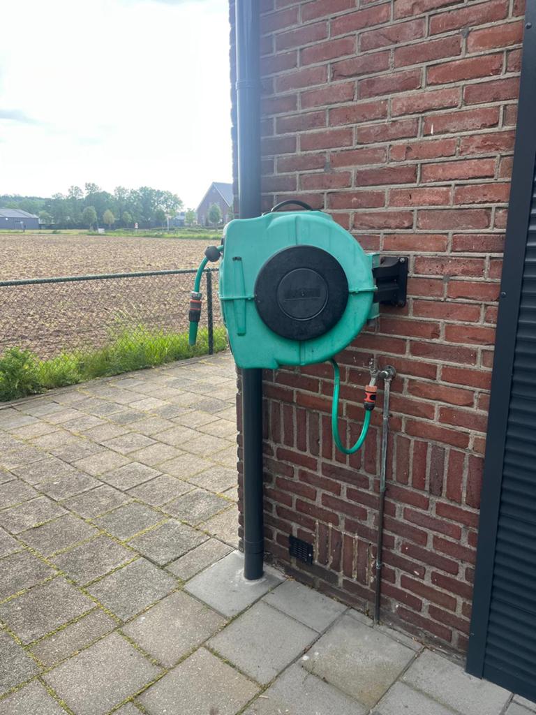 Tuinslang haspel, Ophalen, Gebruikt, Tuinslang