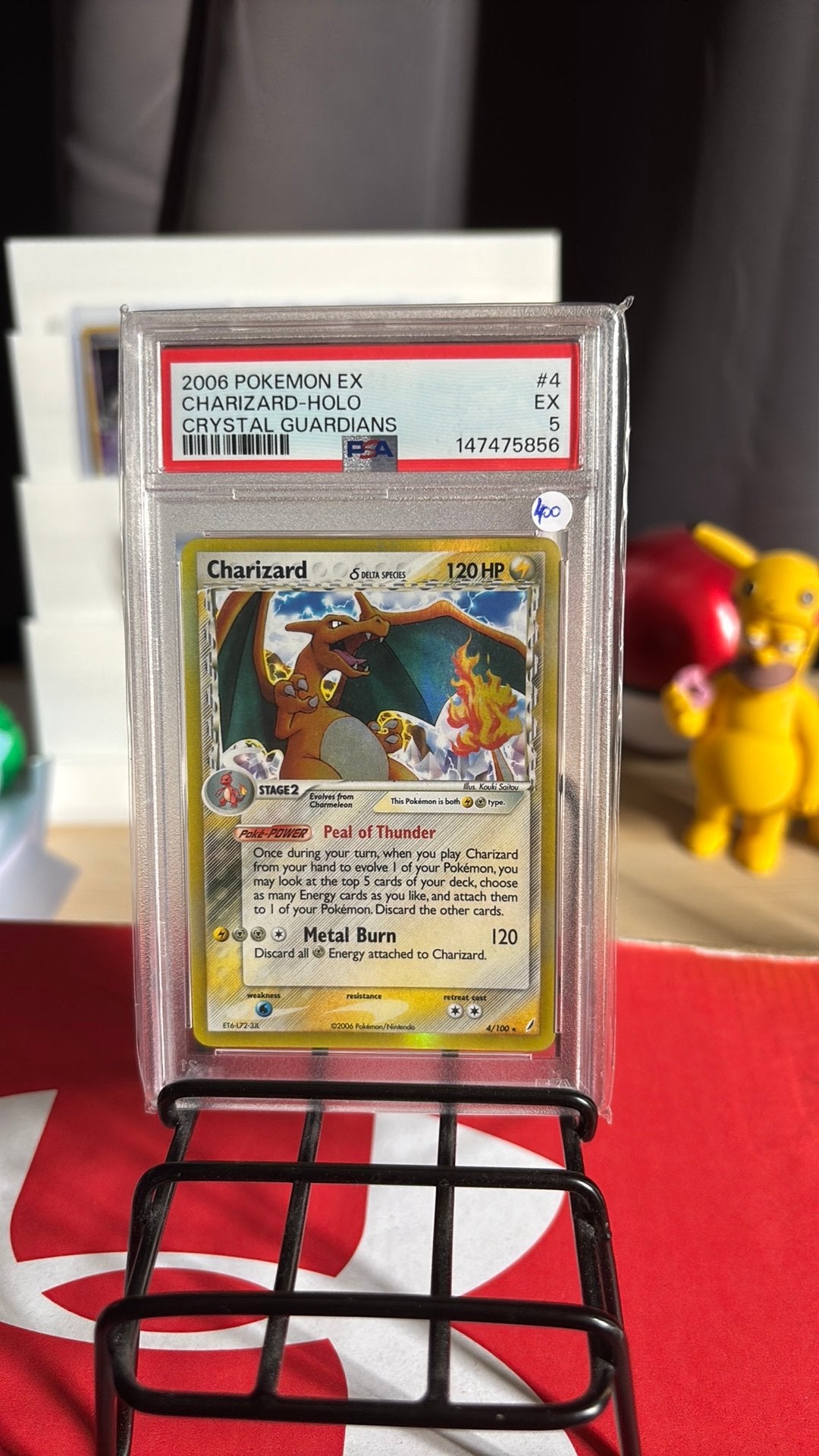 Charizard Delta spieces PSA 5, Ophalen of Verzenden, Zo goed als nieuw