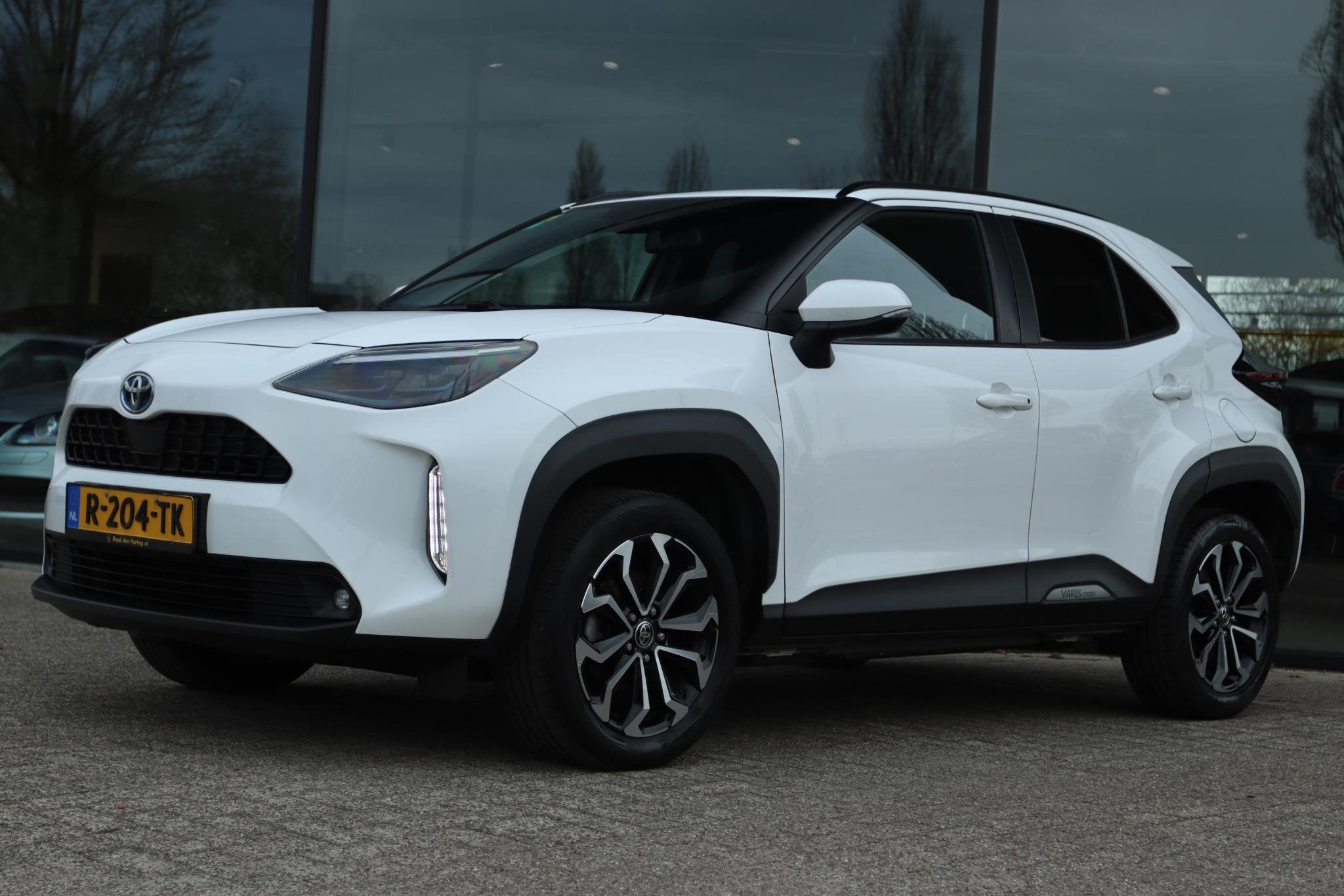 TOYOTA YARIS CROSS 1.5 HYBRID DYNAMIC | CARPLAY | NAVI | CAM, Stof, Gebruikt, 116 pk, Bedrijf