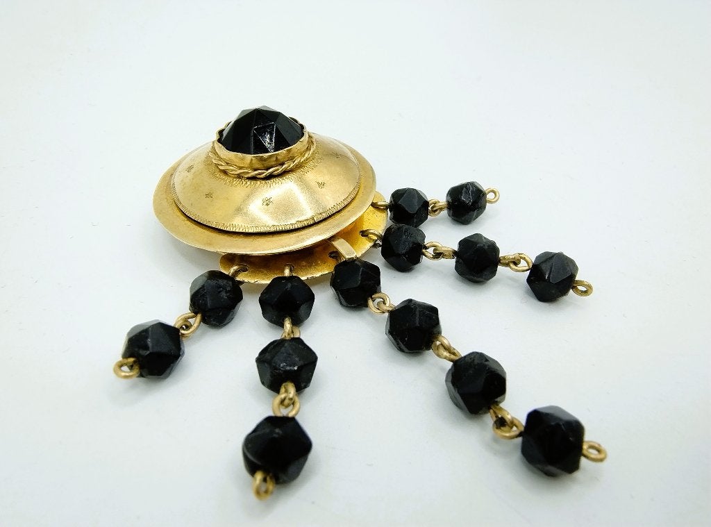 Zilveren broche of slot met gitten, F.J. Treling uit Sneek