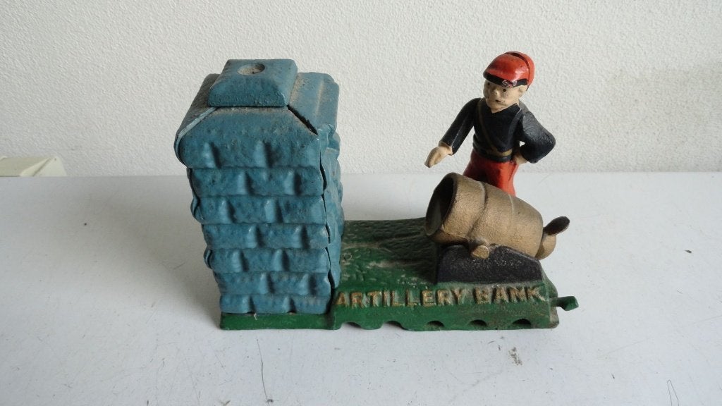 Gietijzeren spaarpot, mechanisch met mannetje en kanon 1930, Ophalen of Verzenden