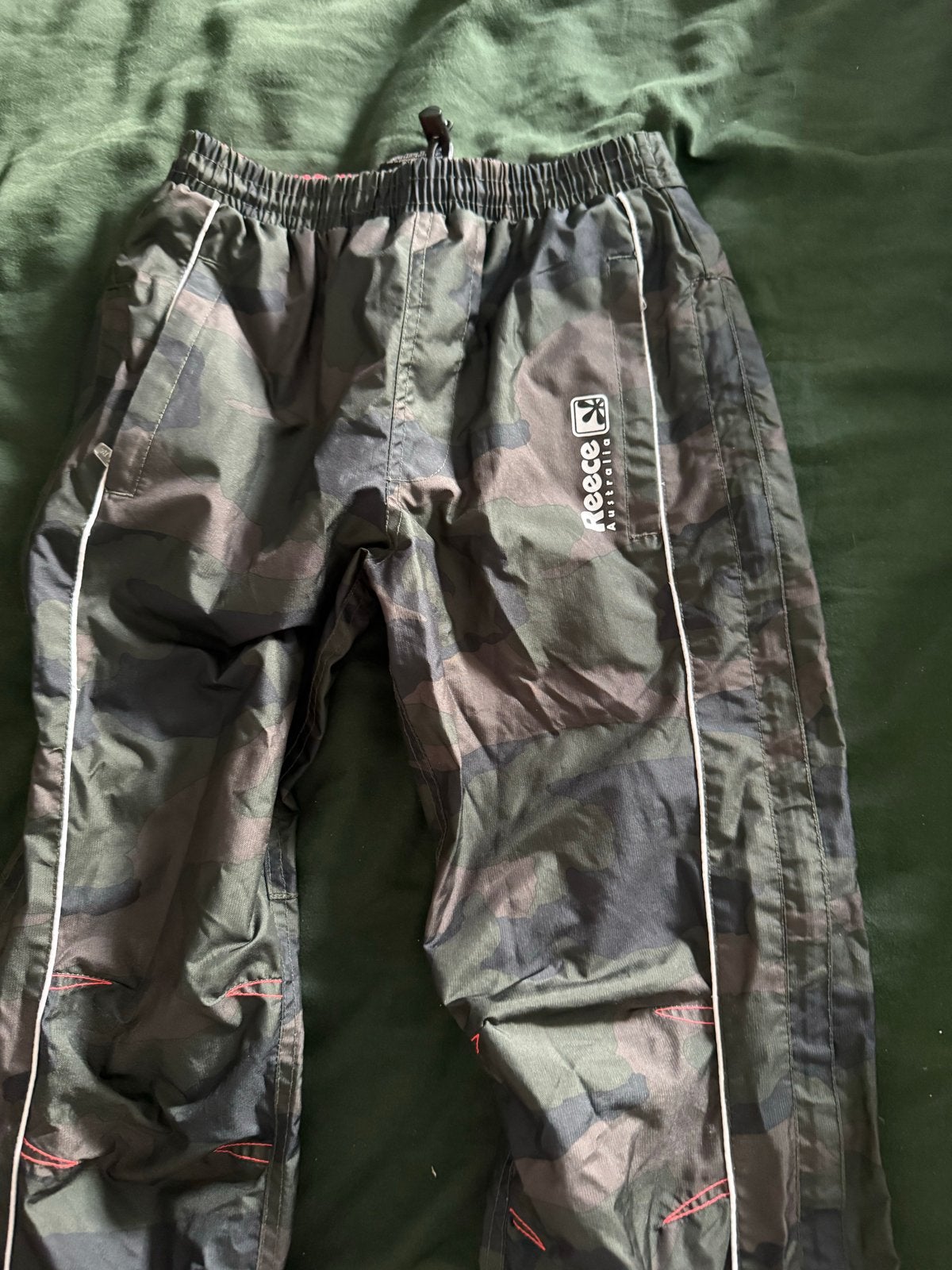 Reece Australia Camouflage. regenbroek.  Maat 128, Ophalen of Verzenden, Gebruikt, Jongen of Meisje