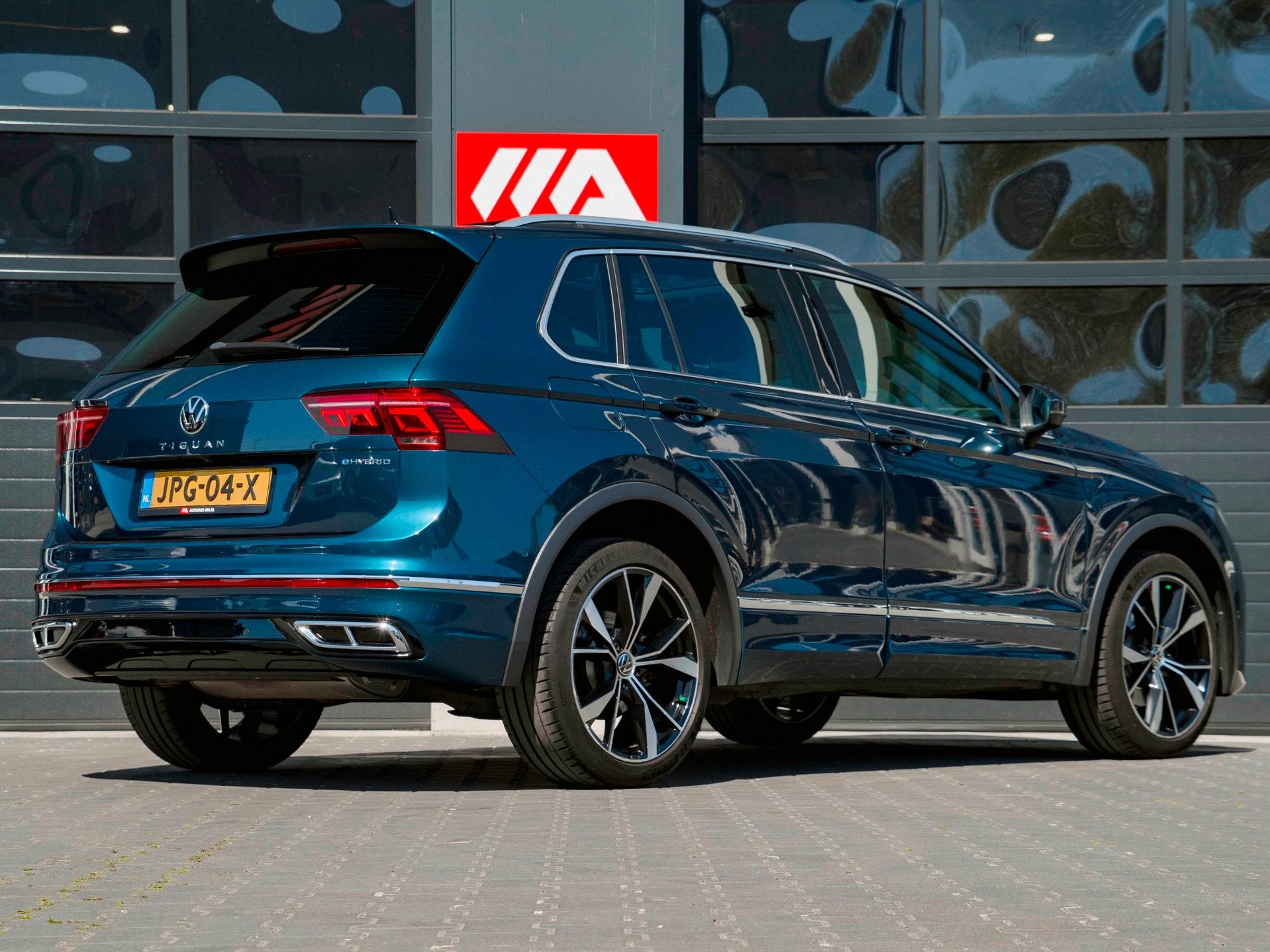 Volkswagen TIGUAN 1.4 TSI eHybrid R-Line Business+, Auto's, Stof, 4 cilinders, Met garantie (alle), Blauw